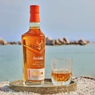 More glenfiddich-21-year-gran-reserva-with-glass.jpg